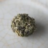Hand-rolled Green Tea Balls - Lei Shan Yin Qiu closeup
